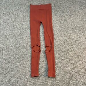 Free people dark orange/brownish ribbed leggings.